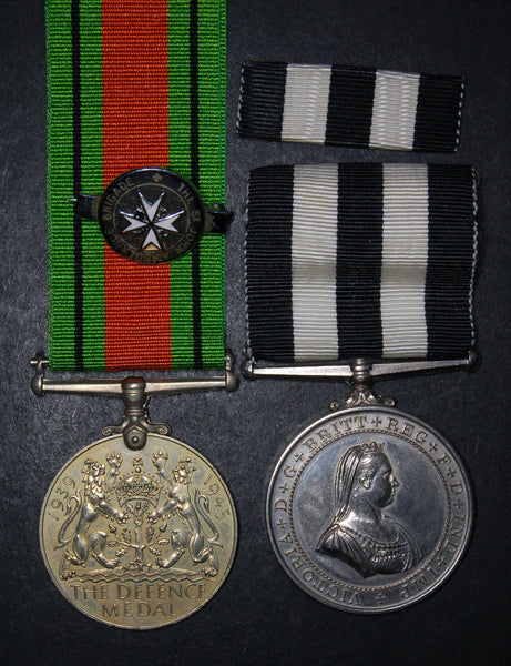 St Johns long service/defence medal pair. Robson