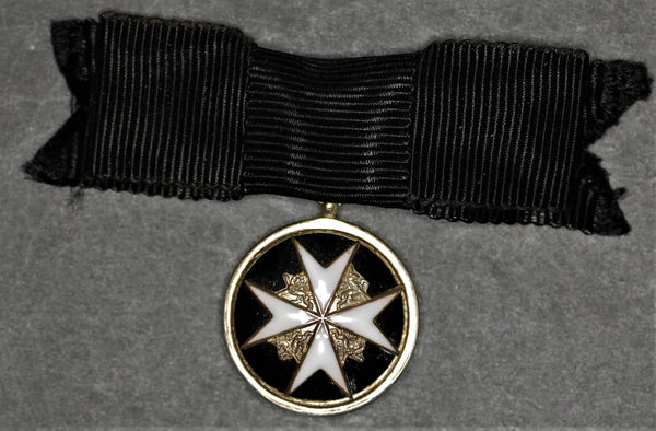 Miniature Order of St John Womens breast badge. Serving Sister.