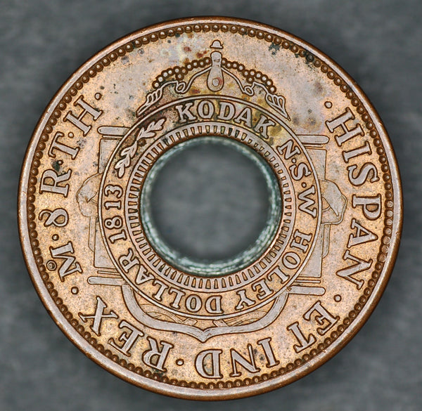 Kodak. Holey dollar token.