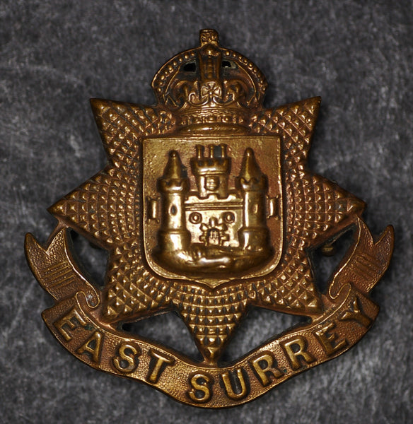 Cap badge. WW1. East Surrey regiment. Economy issue.