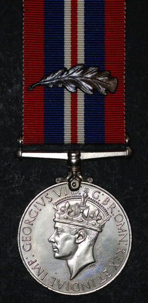 WW2. War medal. With M.I.D. oak leaf